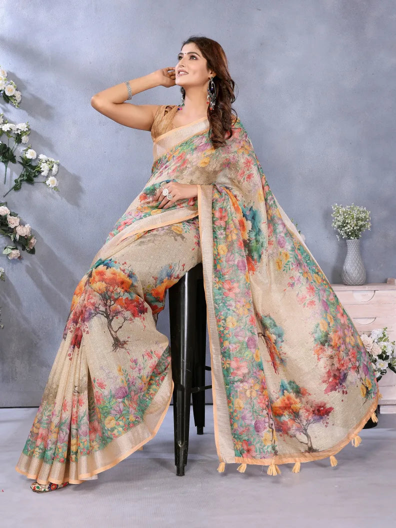 Woman wearing a floral saree with a gray background