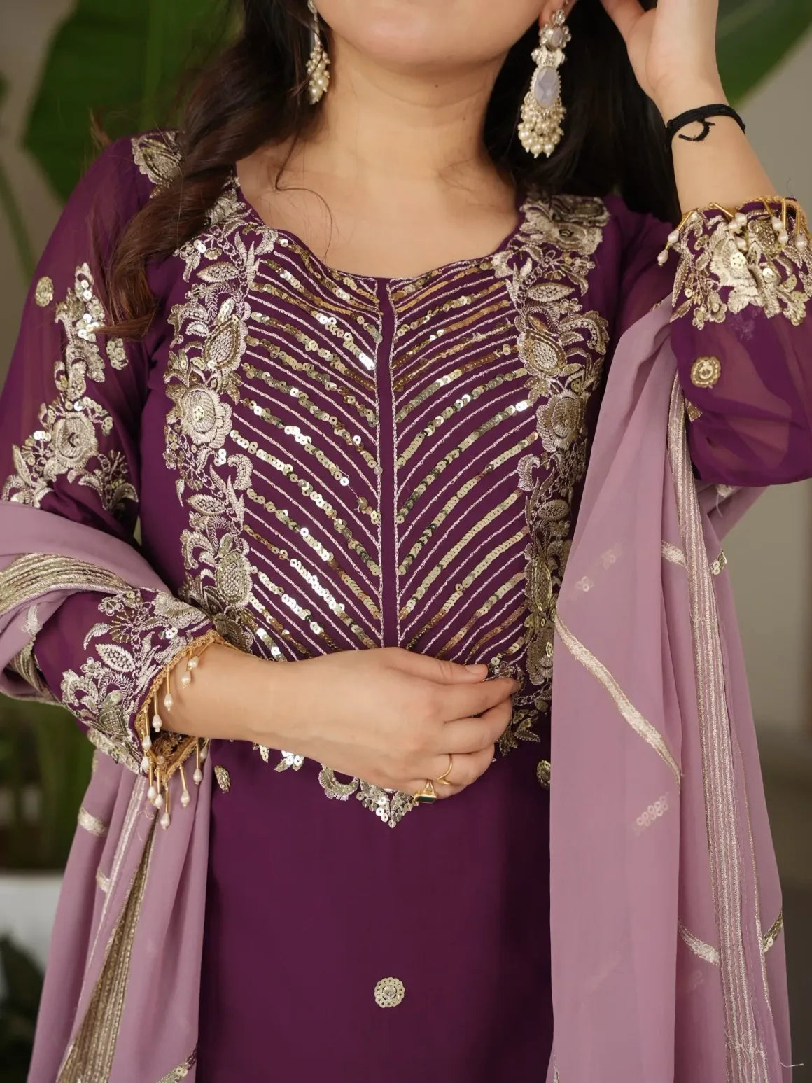Purple embroidered traditional outfit with gold details