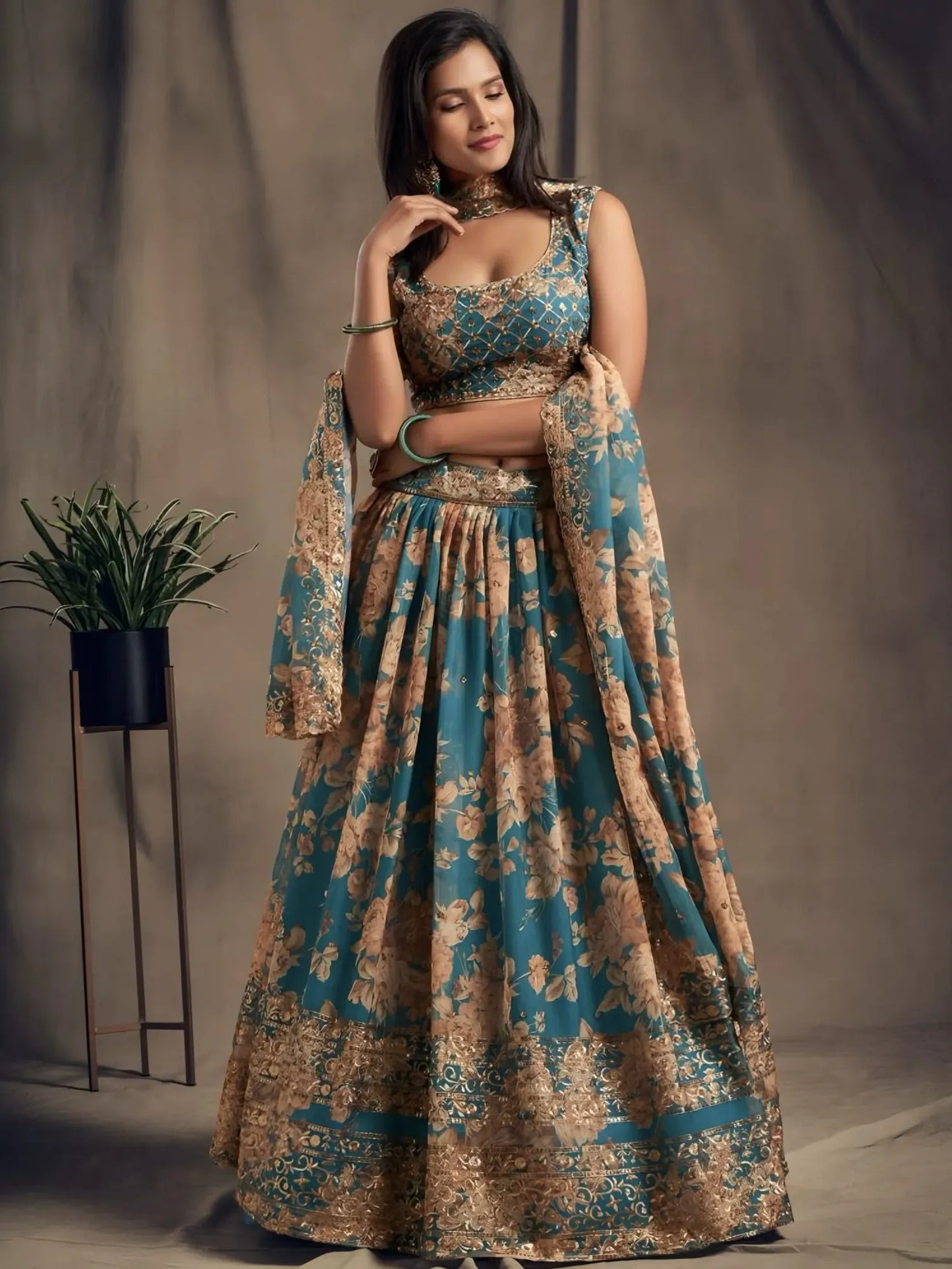 Woman wearing a floral dress with a plant in the background