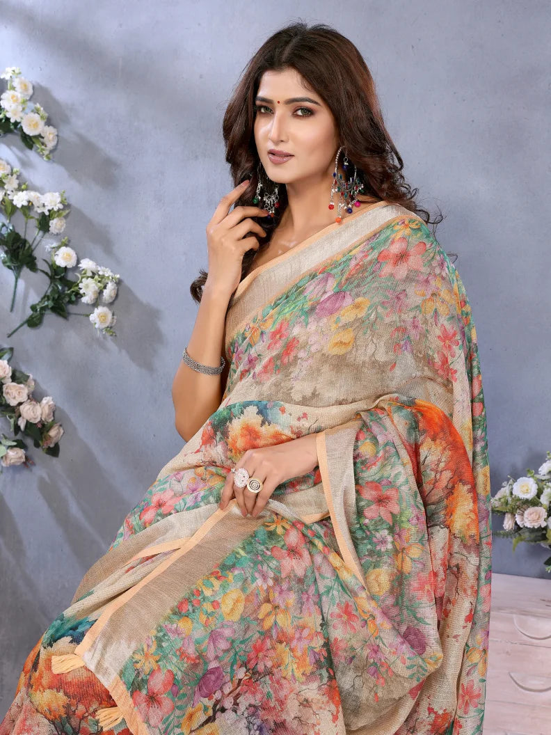 Woman wearing a floral saree with a gray background