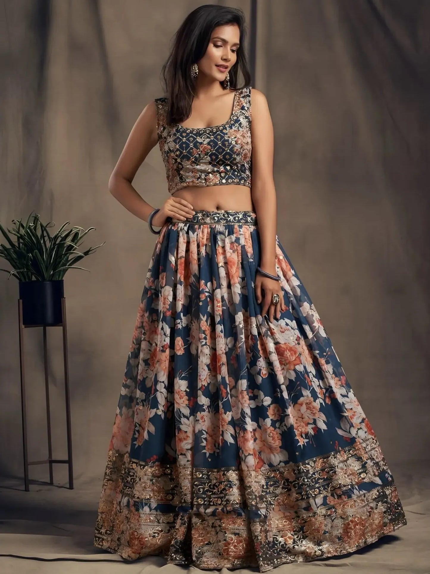 Woman wearing a floral dress against a plain background