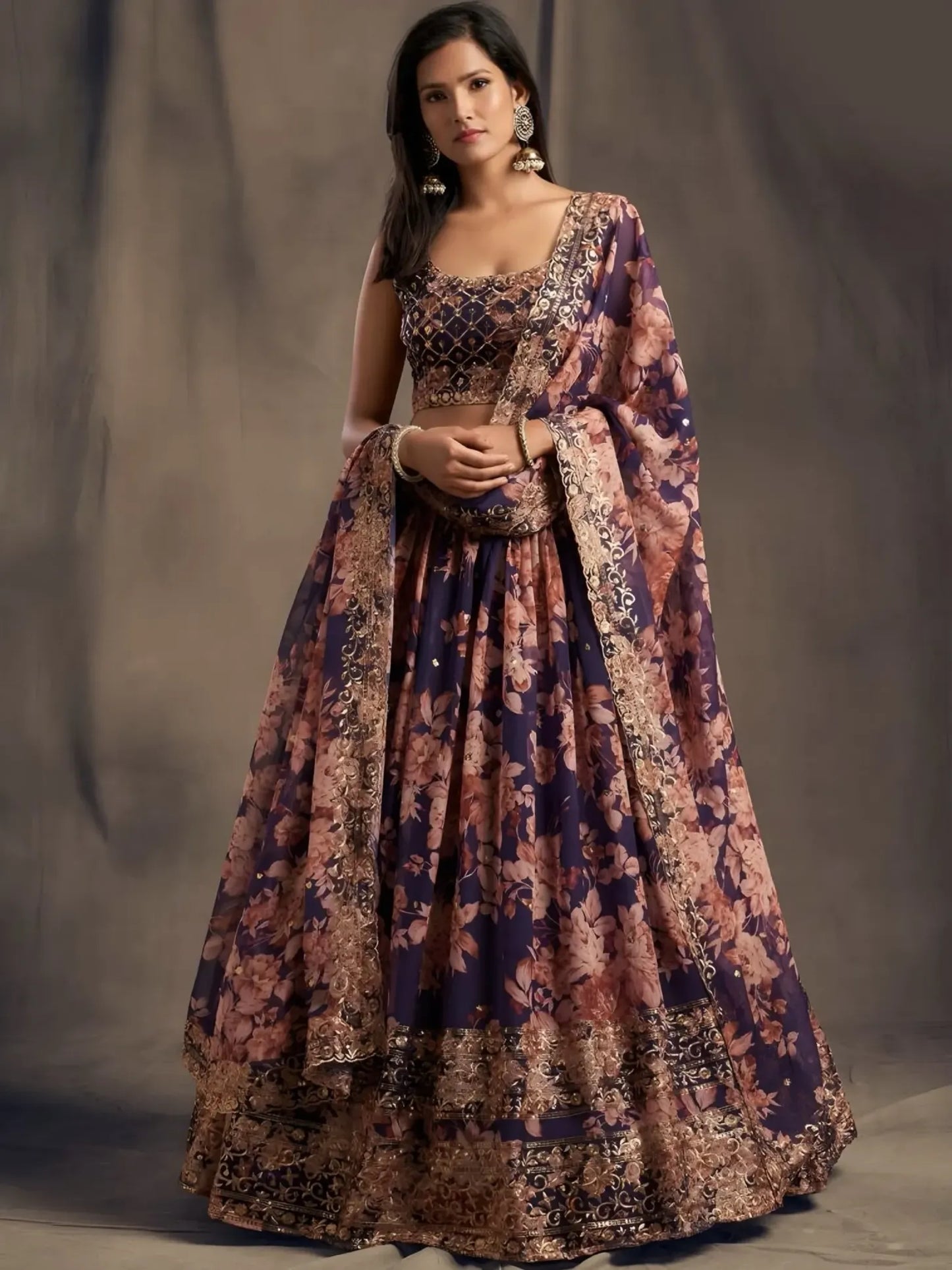 Woman wearing a floral dress with a plain background