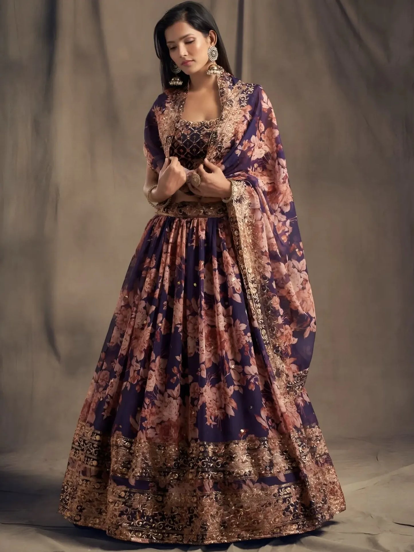 Woman wearing a floral patterned dress against a plain background