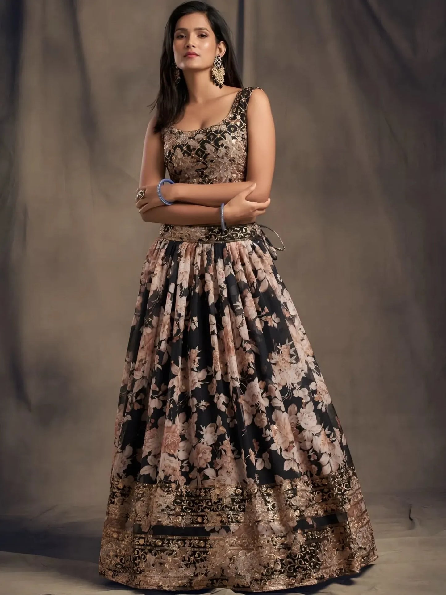 Woman wearing a floral dress against a plain background