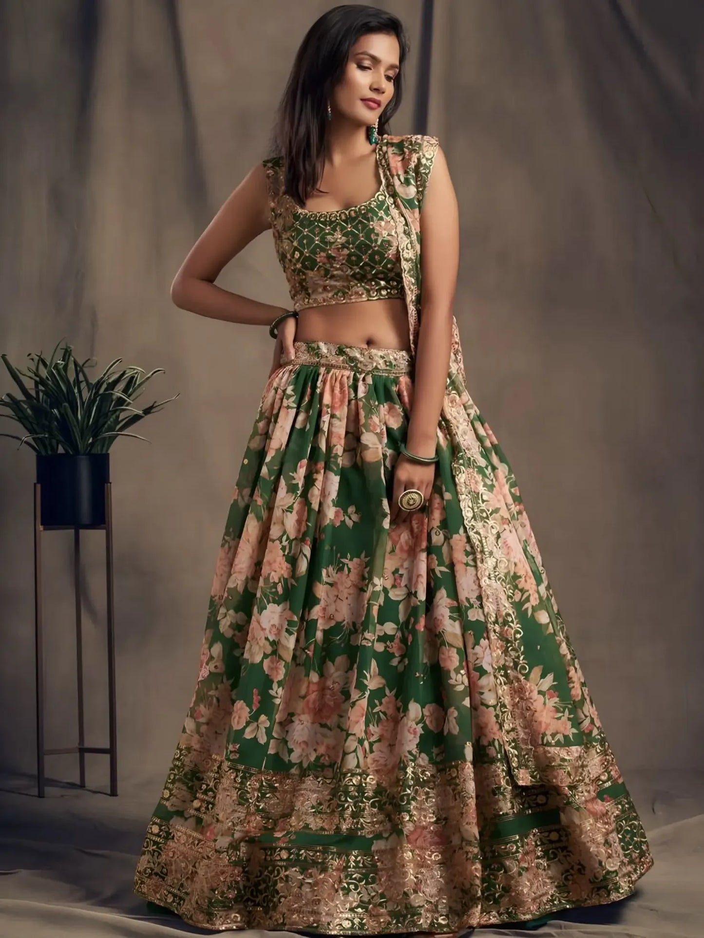 Woman wearing a floral two-piece outfit against a neutral background