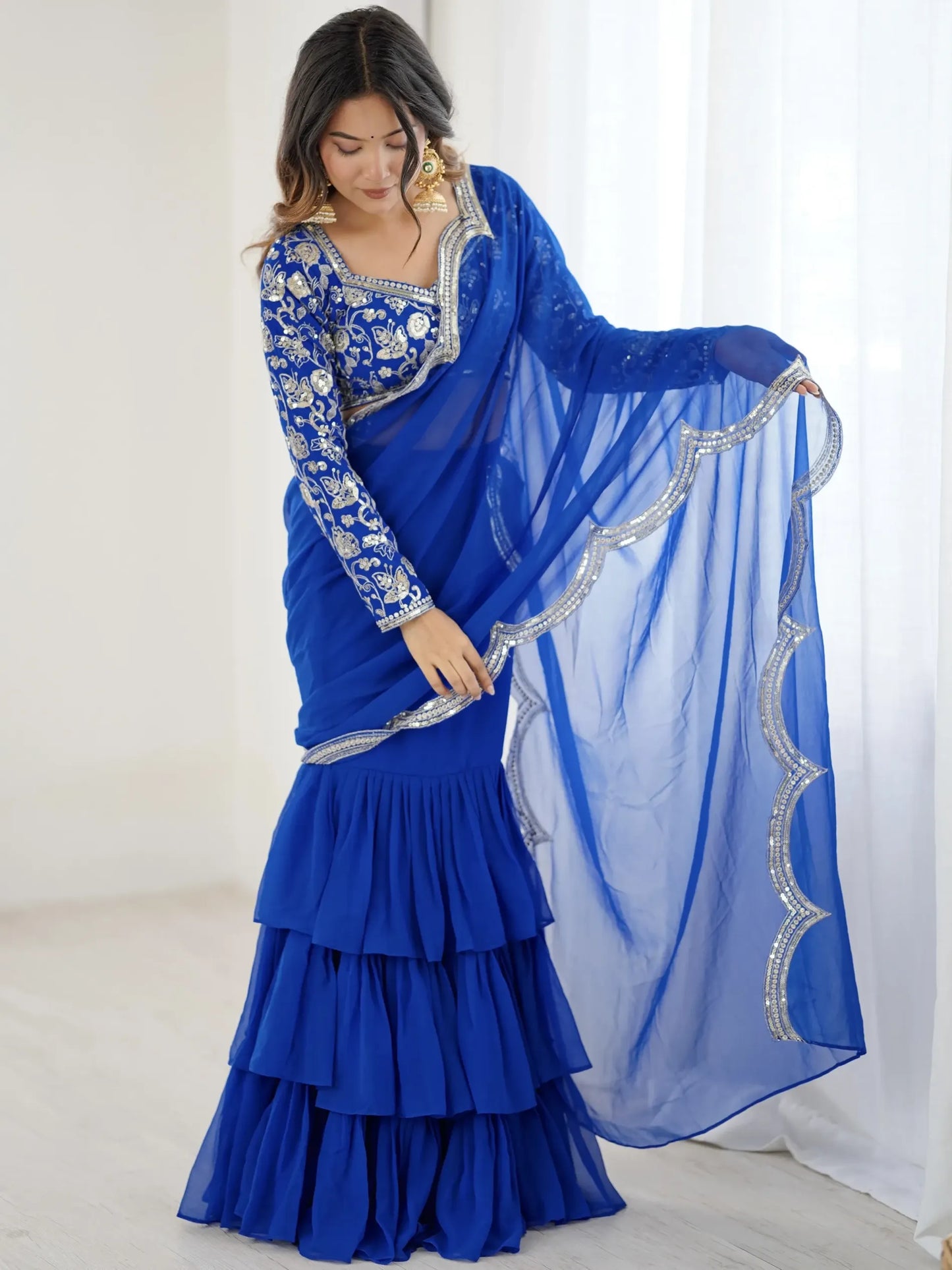 Embroidered Faux Georgette Ruffle Saree