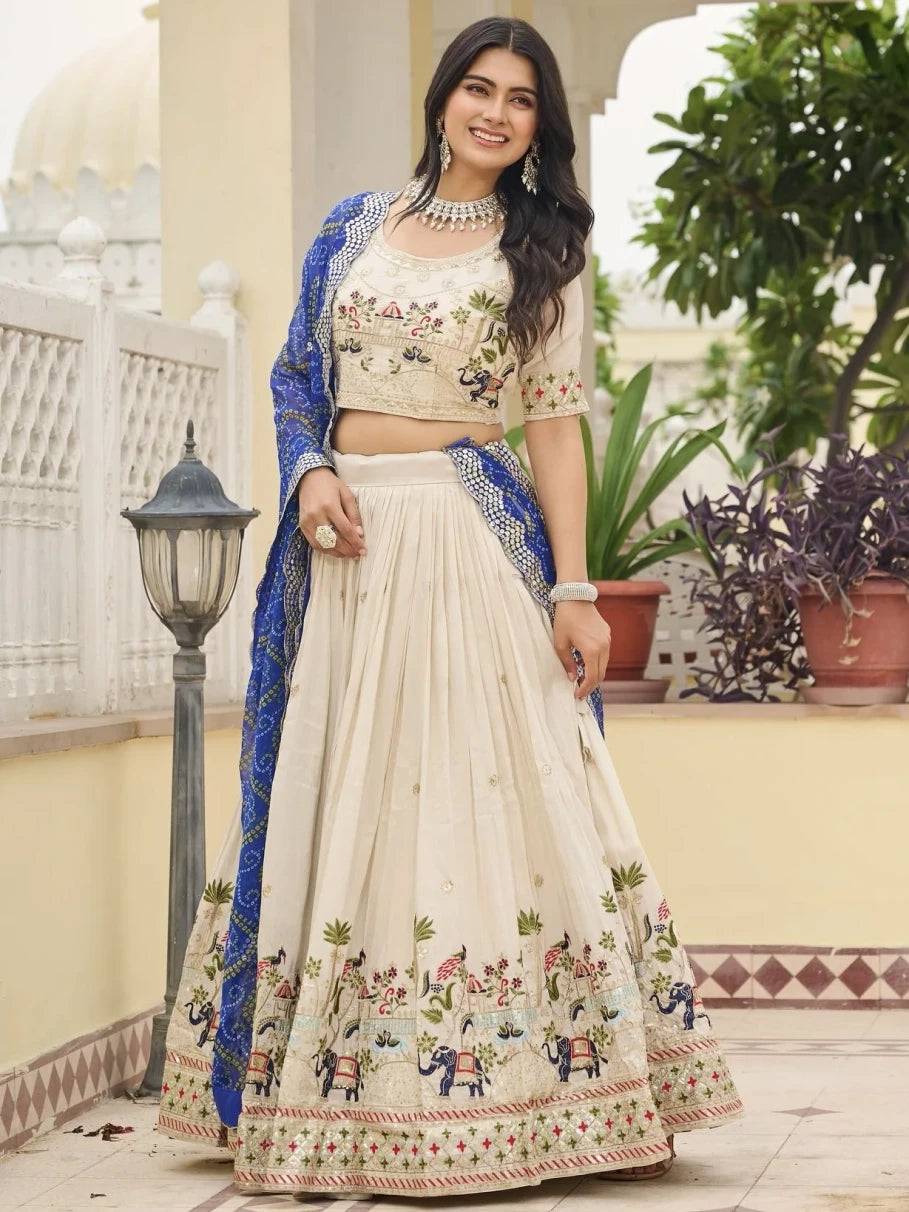 Woman in a traditional outfit with floral patterns in an outdoor setting