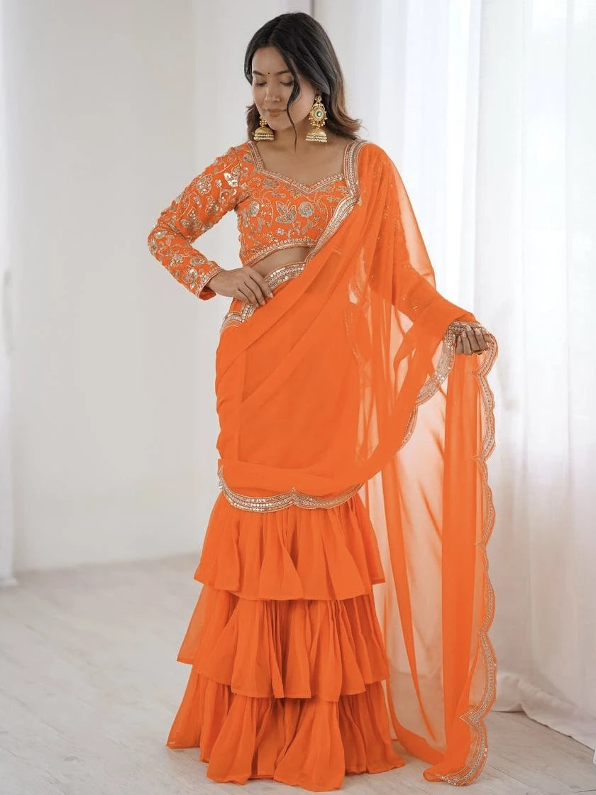 Woman wearing an orange traditional outfit with a white background