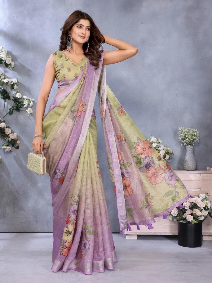 Woman wearing a floral saree with a gray background