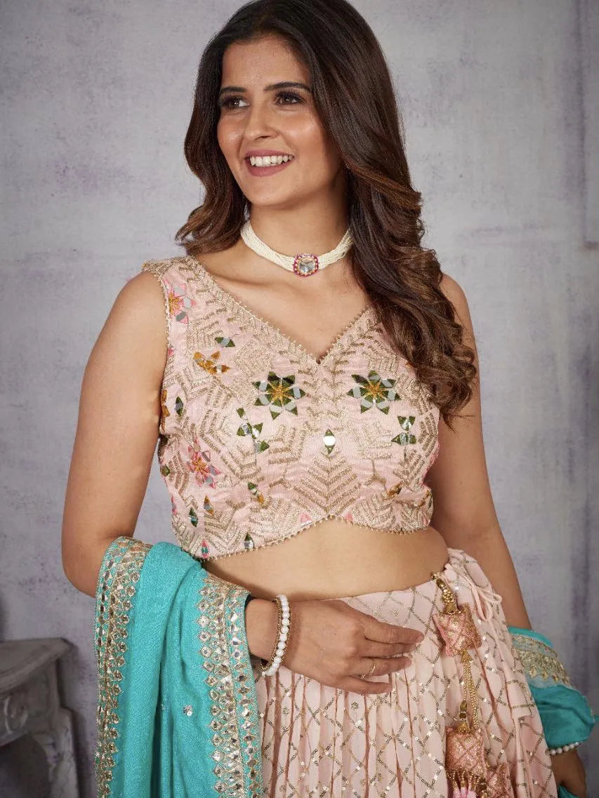Woman wearing a traditional embroidered blouse with a plain background