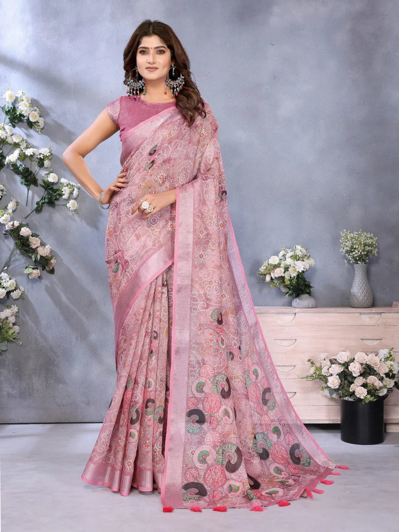 Woman wearing a pink saree with a floral background