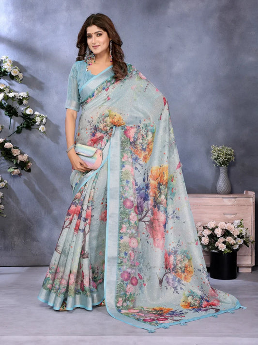 Woman wearing a floral saree with a gray background